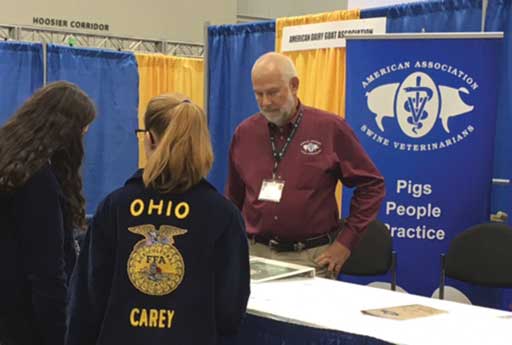 FFA students at AASV table with Dr. Burkgren